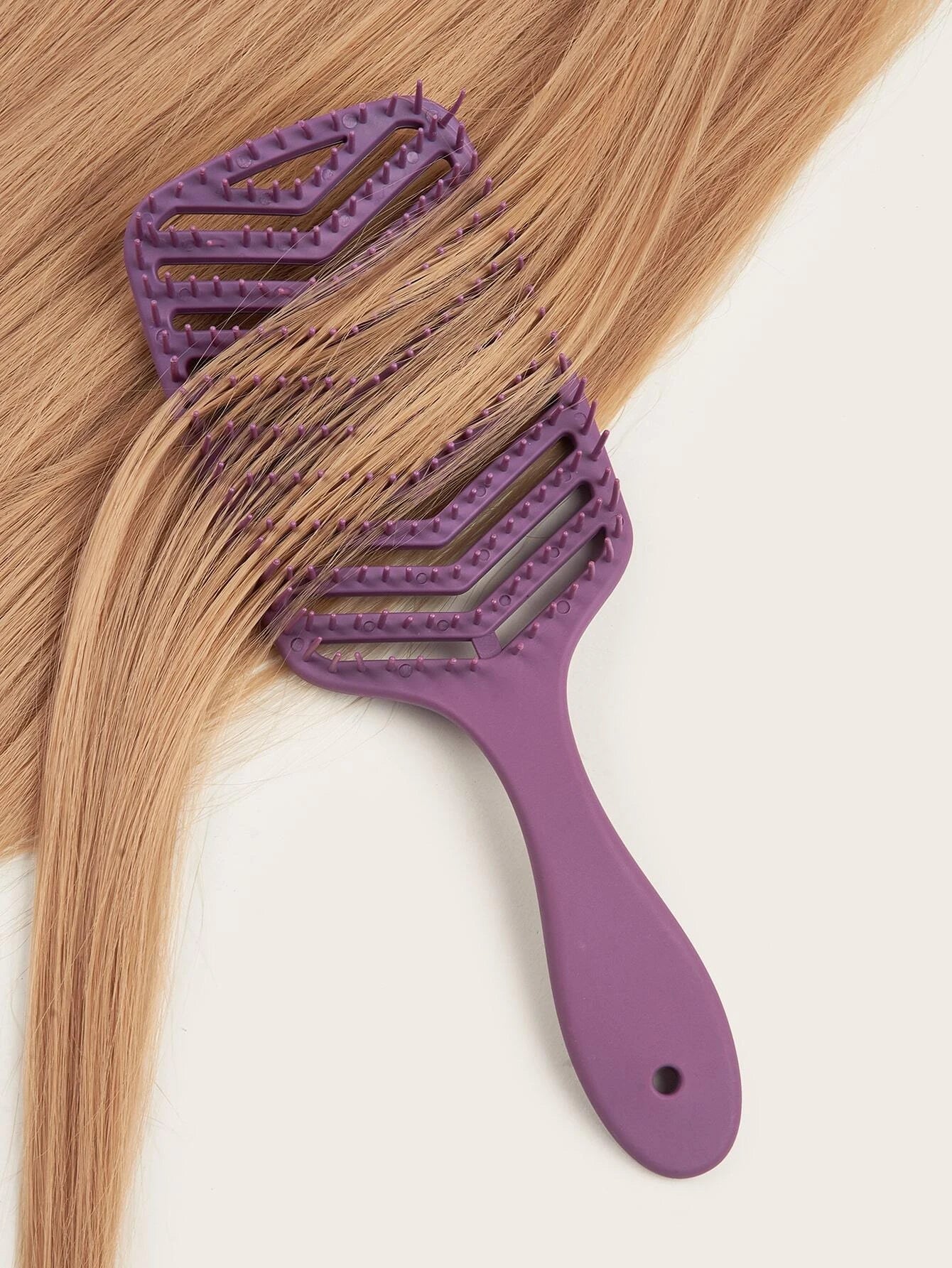 Hollow hair comb and shampoo massage brush